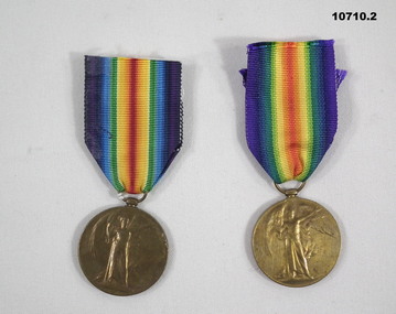 Two WW1 medals with ribbons.
