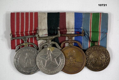 Nepal Dress Bar with four medal set.