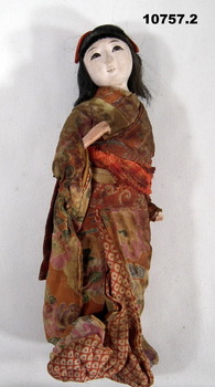 Japanese traditional doll dressed as a girl.