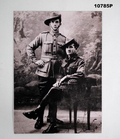 Studio portrait of two WW1 soldiers in uniform.
