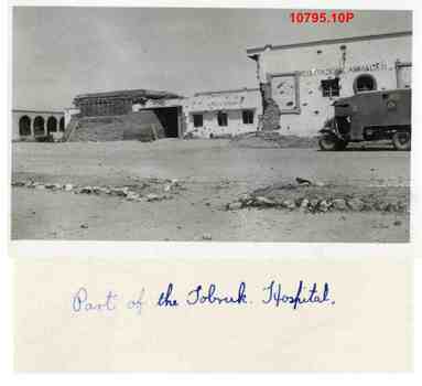 10795.10P Tobruk hospital soon after being taken over by Australians, featuring wrecked Italian Fiat truck