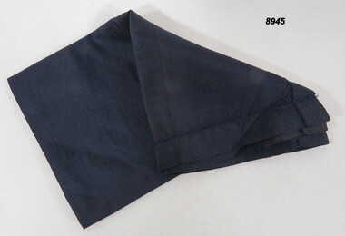 Dark blue silk personal handkerchief.