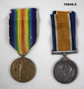 Medals from WWI, British War Medal and Victory Medal.