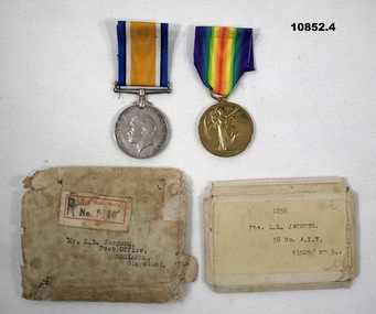 Two Medals from WWI and packaging.