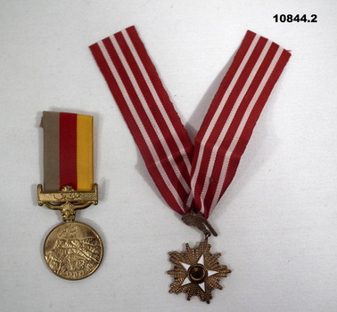 Two Pakistan Military Medals with ribbons.