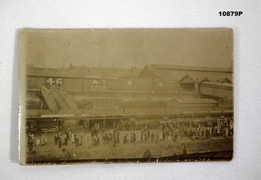 Photograph taken of Wharf as a ship departs.