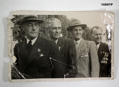 Photo of 4 ex Servicemen lined up, staley collection.
