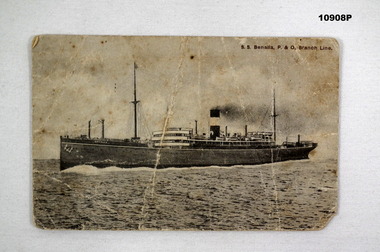 Photographic postcard of a ship at sea.