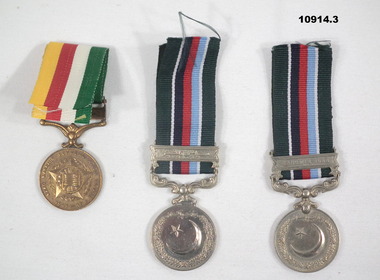 Three military medals and ribbons - Pakistan.