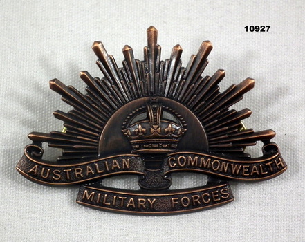 Rising sun badge WW1 with King's crown.