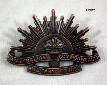 Rising sun badge WW1 with King's crown.