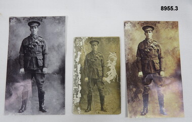 Three copies of a photographic postcard.