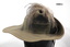 Khaki fur felt slouch hat with feathers.