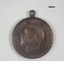 Round medal commemorating the visit of the British Naval Squadron in 1924.