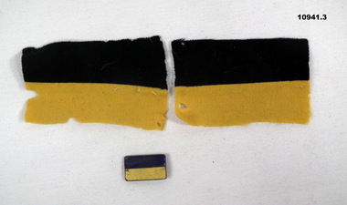 Two 14th Battalion colour patches and a 14th Battalion Association Badge.
