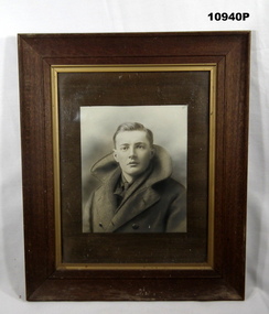Black and white portrait of a WW1 soldier.