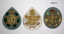 Collection of partially and fully completed badges and brooches.