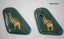 Collection of partially and fully completed badges and brooches.
