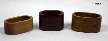 Three timber napkin rings.
