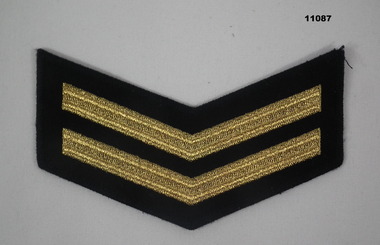Good conduct stripes issued for years of service.