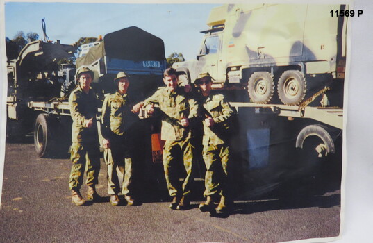 Colour photocopy of Army vehicles and drivers.