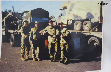 Colour photocopy of Army vehicles and drivers.