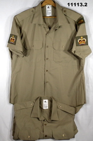 Two Khaki Army Service Dress shirts.