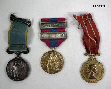 Three various unmounted medals.