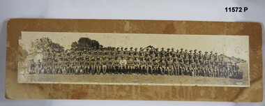 Black and white photo of troops and band, unknown.