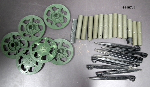 Accessories for tarpaulin, base plates, steel tubes, tent pegs.