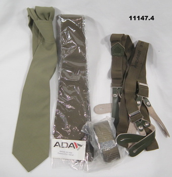 Army accessories, necktie, belt, braces.