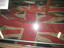 The Banner is a large red ensign displayed in a glass case for protection from the elements