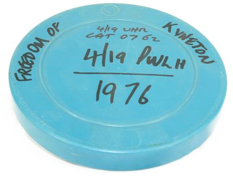 16 mm film, 150 ft, metal reel, blue plastic can