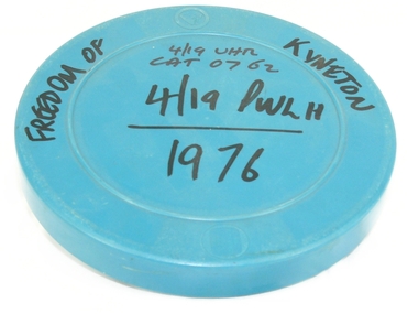 16 mm film, 150 ft, metal reel, blue plastic can