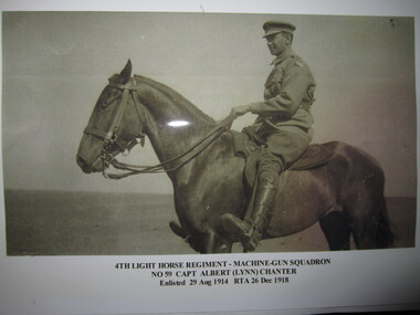 Framed b&w photo of Capt Lynn Chanter, mounted on horseback