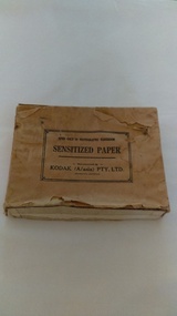 Photographs of small box originally used to contain sensitized photographic paper