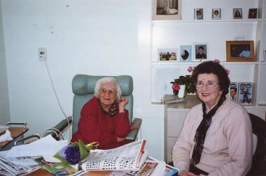 Colour photograph of Nesta Drew and her former teacher