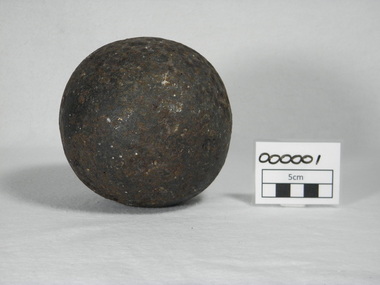 This is a round metal cannonball measuring 5 inches in diameter. 