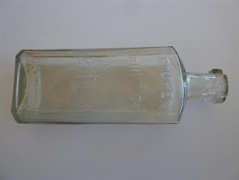 A glass bottle from Uren's Chemist Warrnambool