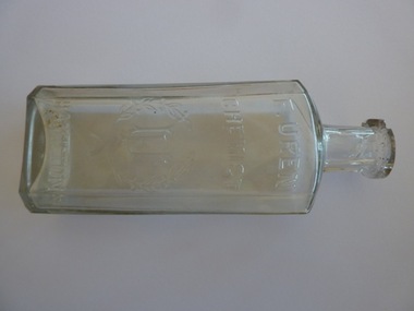A glass bottle from Uren's Chemist Warrnambool