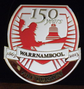 Metal badge produced to celebrate 150 years of the Warrnambool Fire Brigade