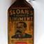 Sloan's family liniment bottle with J Paterson, Chemist 186 Timor St., Warrnambool Phone 31sticker  attached