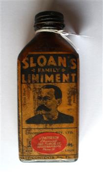 Sloan's family liniment bottle with J Paterson, Chemist 186 Timor St., Warrnambool Phone 31sticker  attached