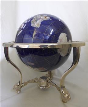  A horse racing trophy .A world globe  on a metal stand 