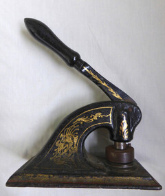 Tool for imprinting Newcombe timber company seal