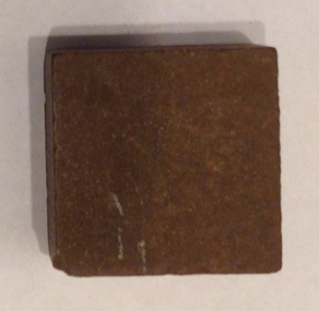 This is a stone which is used for sharpening bladed items.