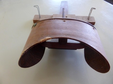 THis is a wooden stereoscope,used to view photographs.