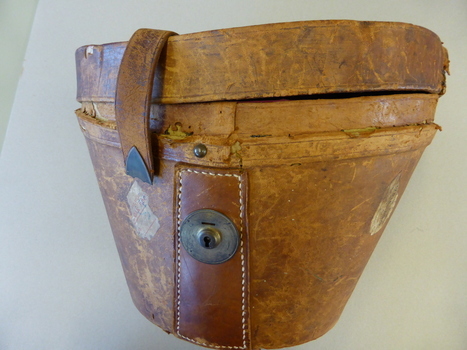 This is ablack top hat and its case which belonged to Mr Beattie of Warrnambool.