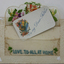 This is a postcard from WW1 which is embroidered on the front and has a small card inserted inside.