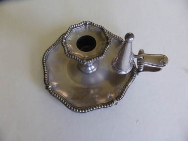 Candlestick holder and snuffer, c. 1900